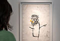 25 angebliche Werke des Künstler Jean-Michel Basquiat, die in einer Ausstellung in den USA gezeigt wurden, stehen unter dem Verdacht gefälscht zu sein. Im Bild ein Basquiat an einer Kunstshow in Basel im Jahr 2019. (Archivbild)