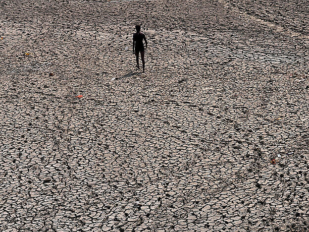 ARCHIV - Die Klimakrise ist eine der größten globalen Herausforderungen. Foto: Manish Swarup/AP/dpa